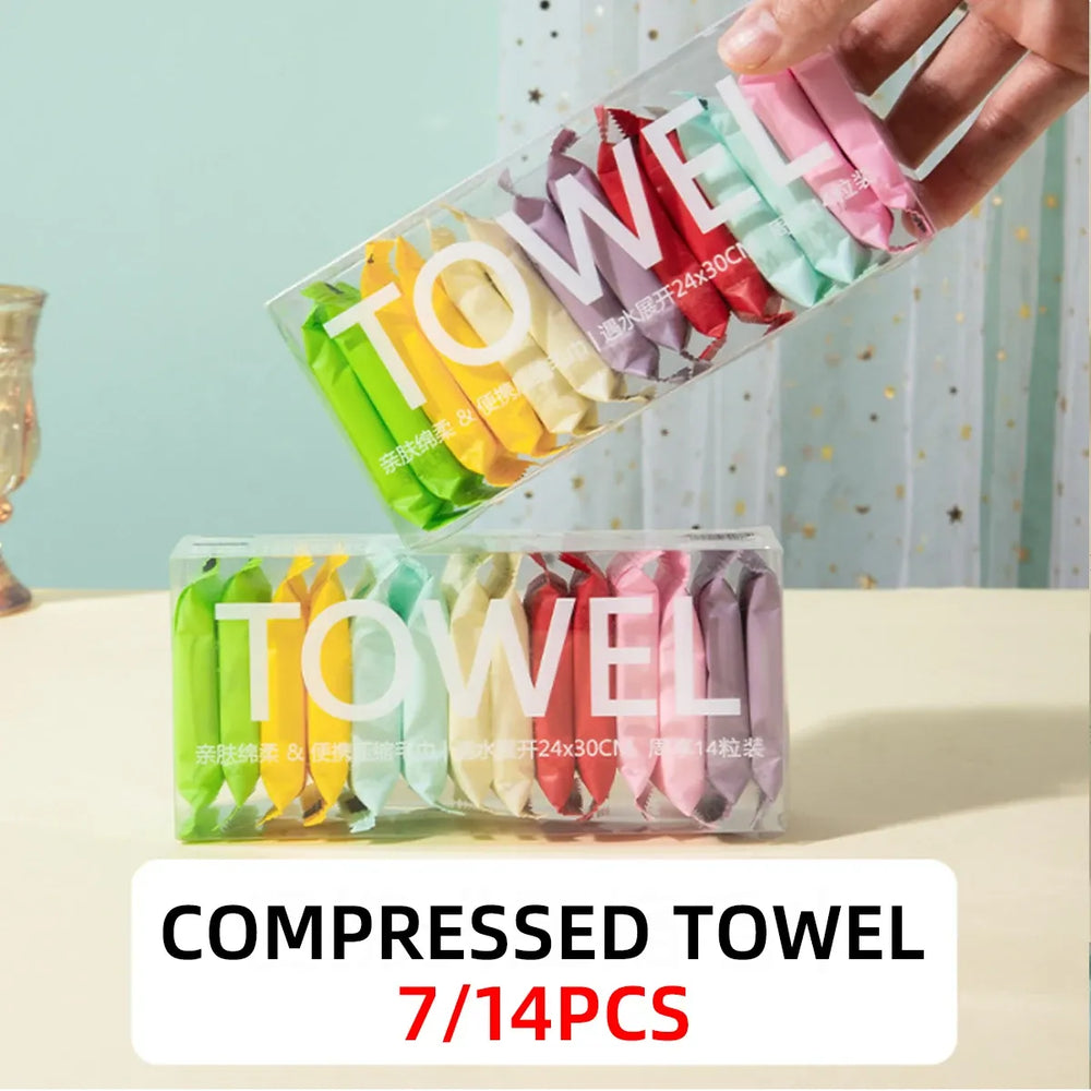 14-piece disposable compressed travel washcloths that expand with water for convenient personal cleaning.