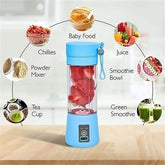 Blue portable blender with various food items and uses displayed around it on a light background