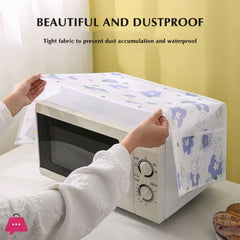 Person placing a dustproof cover on a microwave oven