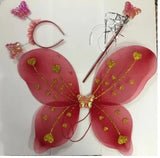 Butterfly costume set with red wings, pink headband, and wand on a white background