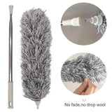 Gray feather duster with a telescopic handle, showing close-ups of the bristles and handle.