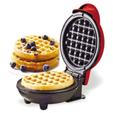 Waffle maker with a stack of blueberry waffles on a white background