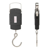 Black electronic hanging scale with a hook on a white background