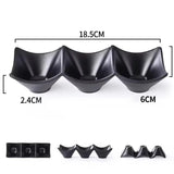 Three black ceramic bowls arranged in a row on a white background, with measurement lines and labels showing 18.5 cm width, 2.