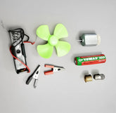 Electronic components including a motor, battery, and propeller on a gray background