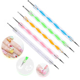 Set of colorful nail art brushes with a close-up of nail art design on a white background.