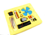 Science experiment kit with components on a yellow tray