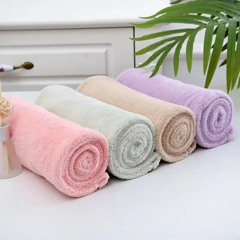 Quick-dry soft and absorbent hair drying towel cap for women, designed to gently dry hair and reduce drying time.