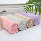 Quick-dry soft and absorbent hair drying towel cap for women, designed to gently dry hair and reduce drying time.