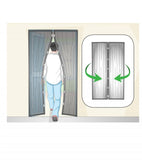 Instructional diagram showing a person walking through a pair of magnetic door panels, with a callout inset illustrating the doors swinging inward.