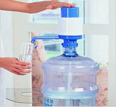Manual hand press water bottle dispenser pump for easy and convenient water dispensing from large bottles.
