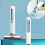 White cleaning tool with water flowing from a faucet on a blue background