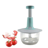 Turquoise kitchen chopper with tomatoes on a white background