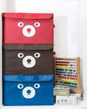 Three bear-themed storage bags in red, brown, and blue on a white background with educational toys.