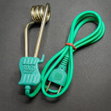 Green heating element with coiled wire on a gray background