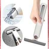Hand holding a cleaning tool with close-up insets of water flow and surface cleaning.