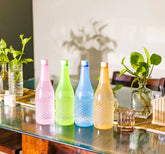 Set of 4 jumbo plastic water bottles with 1.2L capacity for daily hydration and outdoor use.