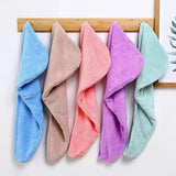 Soft absorbent hair wrap towel for women, ideal for use after showers, baths, and hair washing.