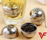 Stainless steel tea ball infuser strainer for brewing loose leaf tea with ease.