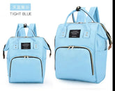 Two light blue bags with black accents on a white background