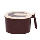 Brown container with a beige lid on a white background