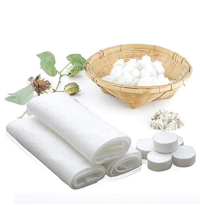 Cotton products including cotton balls, cotton rolls, and a basket of cotton on a white background.
