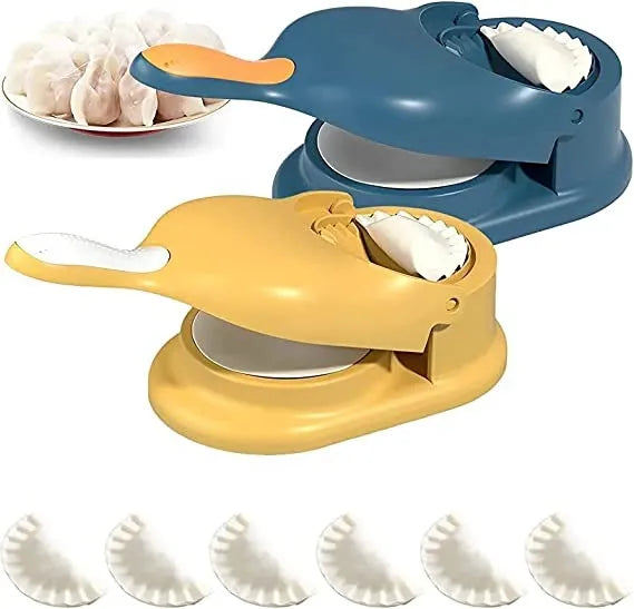 Two kitchen tools, one yellow and one blue, used for making dumplings with a plate of dumplings in the background.