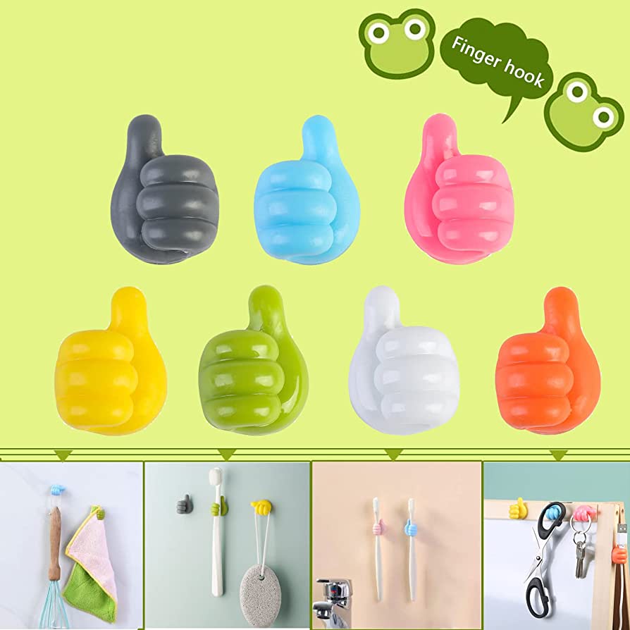 Colorful finger hooks shaped like thumbs on a green background with additional usage examples.