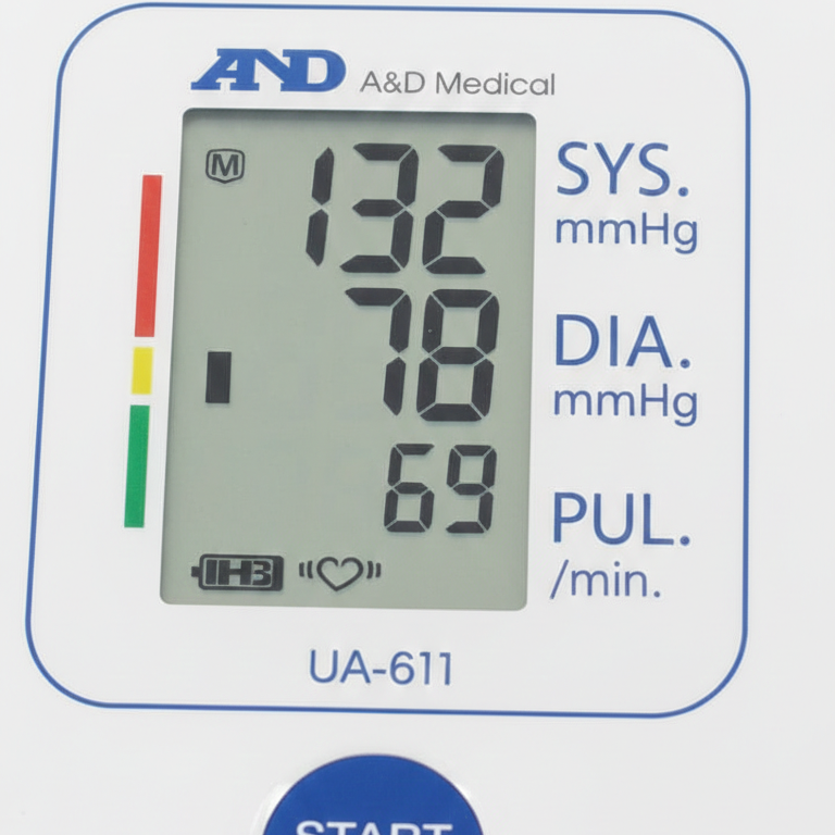 Digital blood pressure monitor displaying readings with A&D Medical branding.