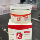 Melodine container and box on a dark surface