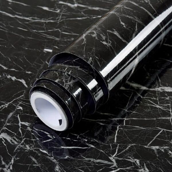 Black and silver on a black marble surface