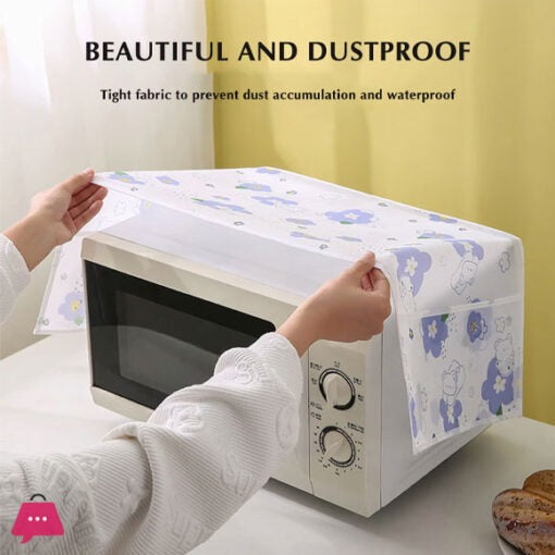 Person placing a dustproof cover on a microwave oven