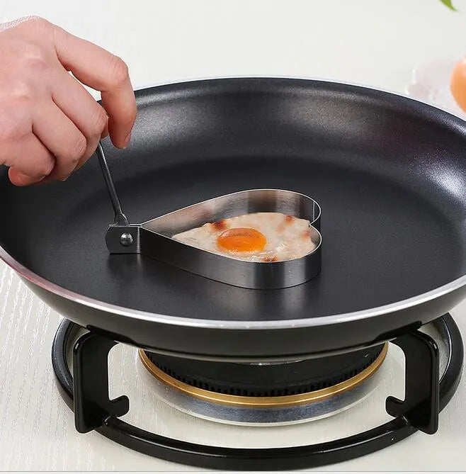 4-piece stainless steel egg ring mold set for shaping eggs, pancakes, and other breakfast favorites.