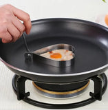 4-piece stainless steel egg ring mold set for shaping eggs, pancakes, and other breakfast favorites.