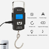 Digital hanging scale with USB charging cable on a white background