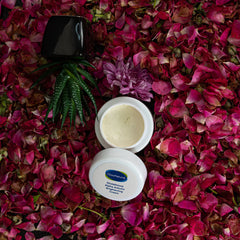 Open jar of cream of glownatural