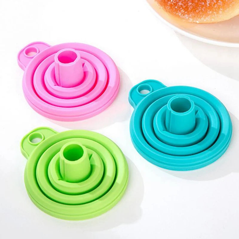 Three colorful silicone bottle covers on a white background