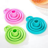 Three colorful silicone bottle covers on a white background