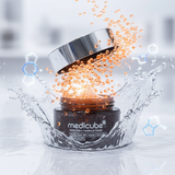 Medicube skincare product with orange capsules