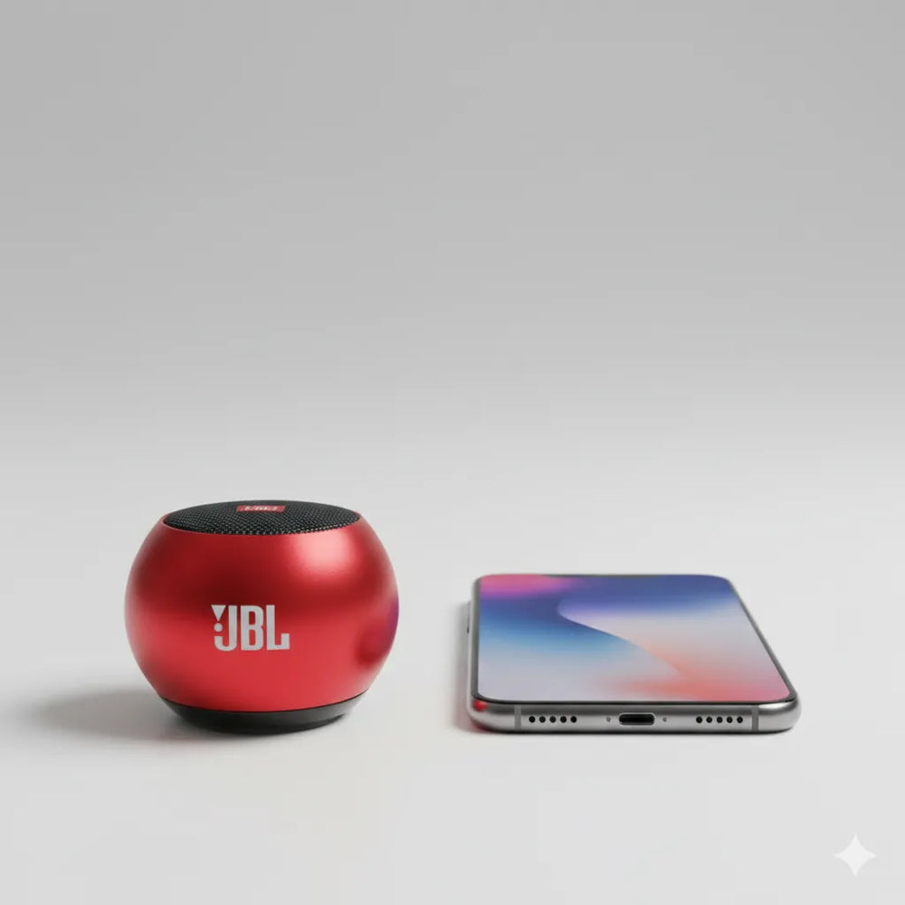 Red JBL speaker next to a smartphone on a light gray background