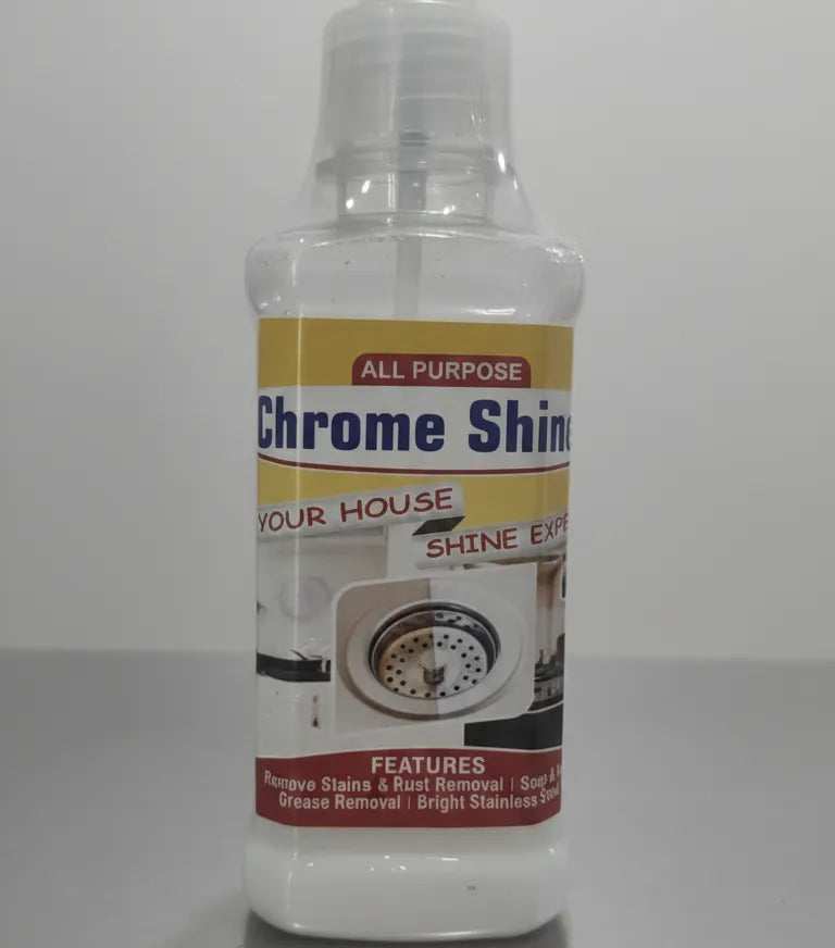 A bottle of Chrome Shine All Purpose Shine Express cleaning liquid, featuring a yellow, white, and red label with a drain cleaner graphic, set against a plain gray background.