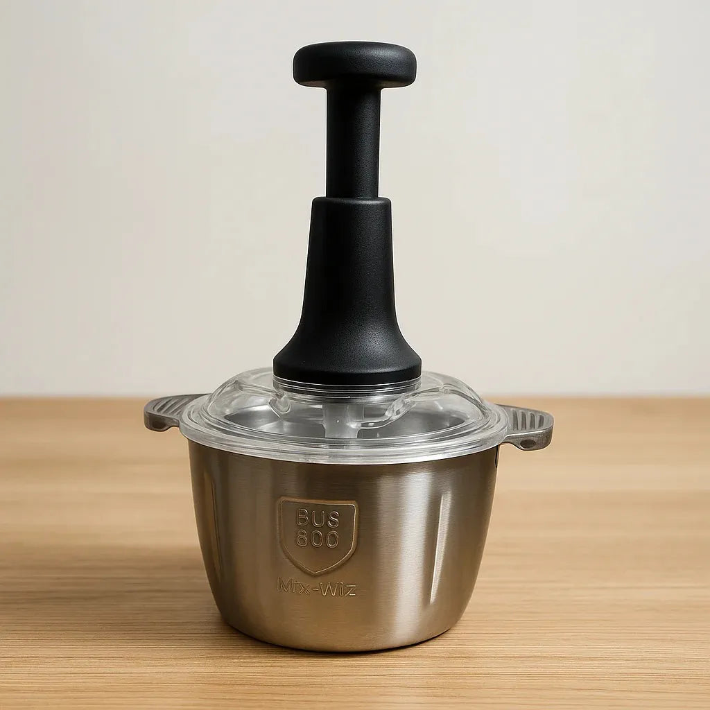 Stainless steel kitchen tool with black handle on a wooden surface