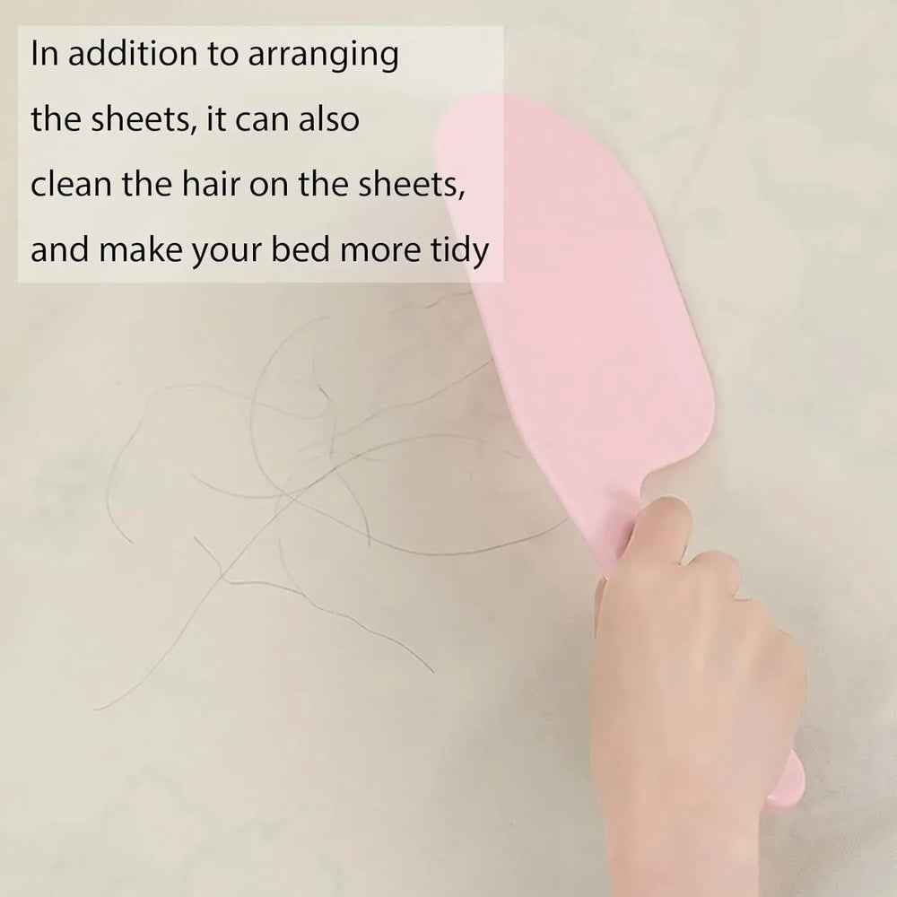 Pink hairbrush being used on a bed with text overlay.