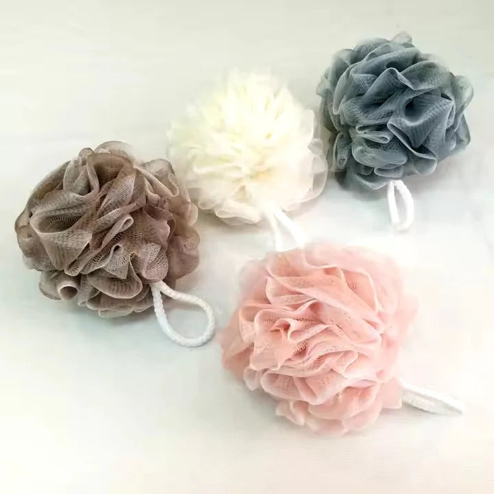 Body loofah shower scrubber with a soft mesh design for comfortable exfoliation and deep cleansing.