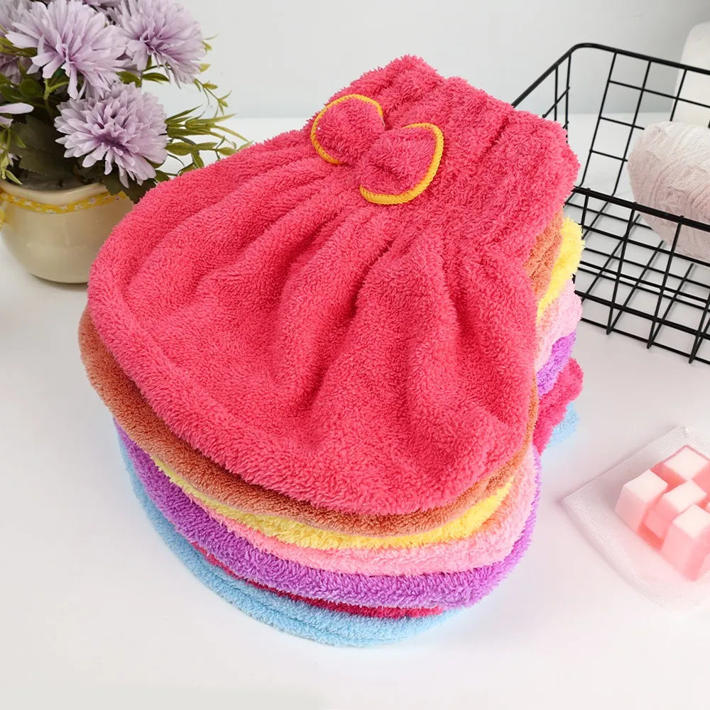 Microfiber hair wrap with a decorative bow for comfortable and efficient hair drying.