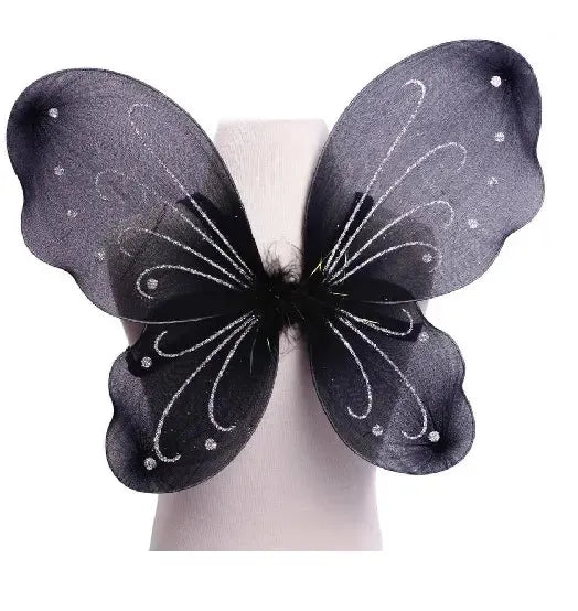 Black butterfly wings with silver embellishments on a mannequin against a white background