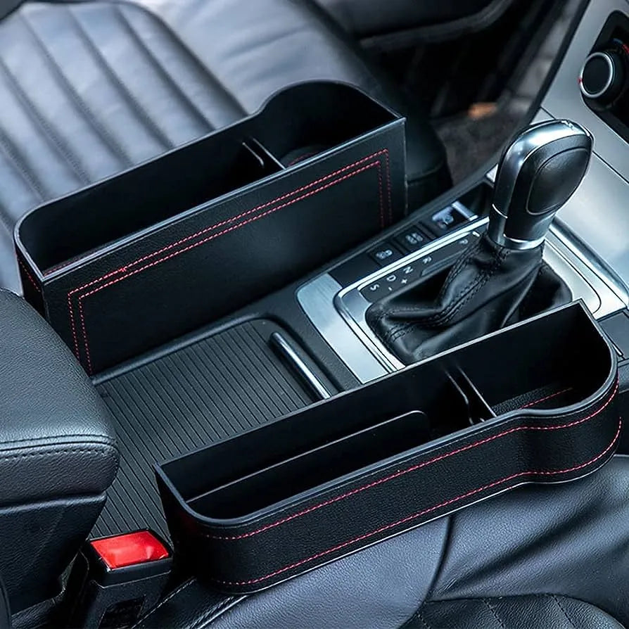 Car organizer with red stitching inside a vehicle