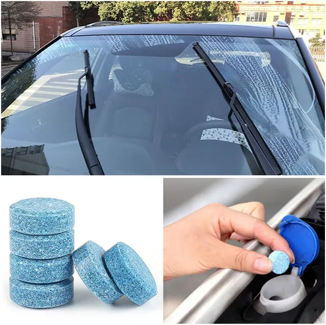 Car windshield cleaning tablets with a car and a hand applying the tablets.