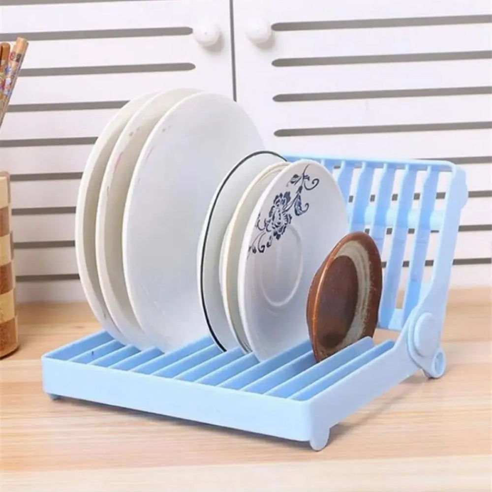 Compact foldable dish rack for air-drying dishes, cups, and cutlery in small kitchens.