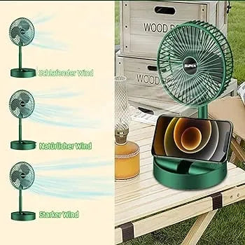 A green portable desk fan shown in a split layout: the left side shows three fan wind modes with text labels, and the right side shows the fan on a folding table outdoors beside a phone charging dock.